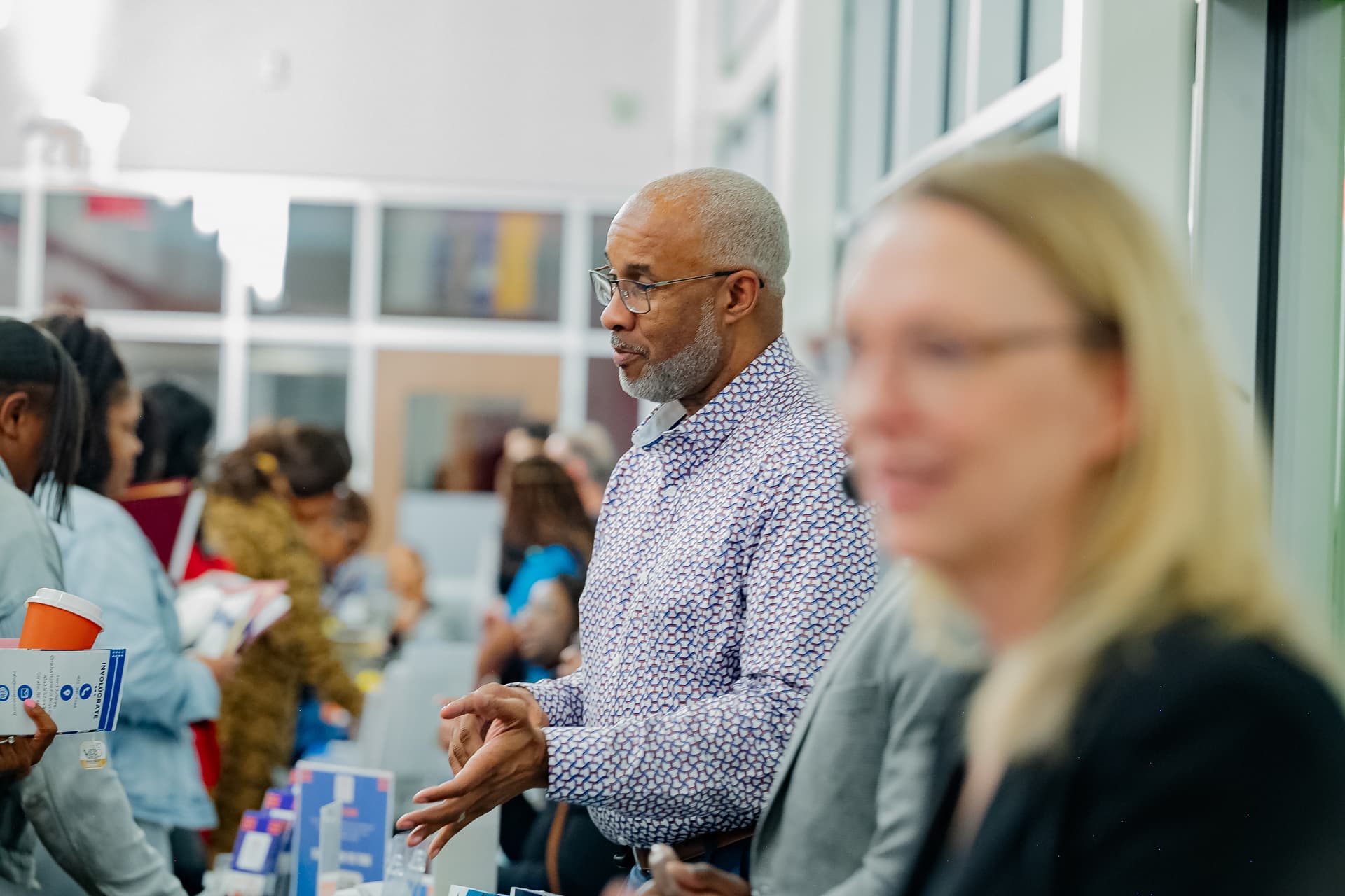 A presenter speaking at the Legacy North Foundation financial literacy program